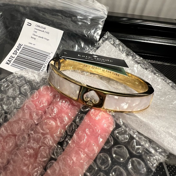 kate spade Jewelry - SALE Kate Spade Hole Punch Spade Hinge Bangle